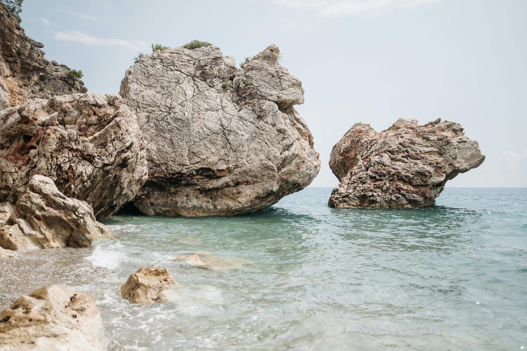 Brown Rock Formations on the Shore