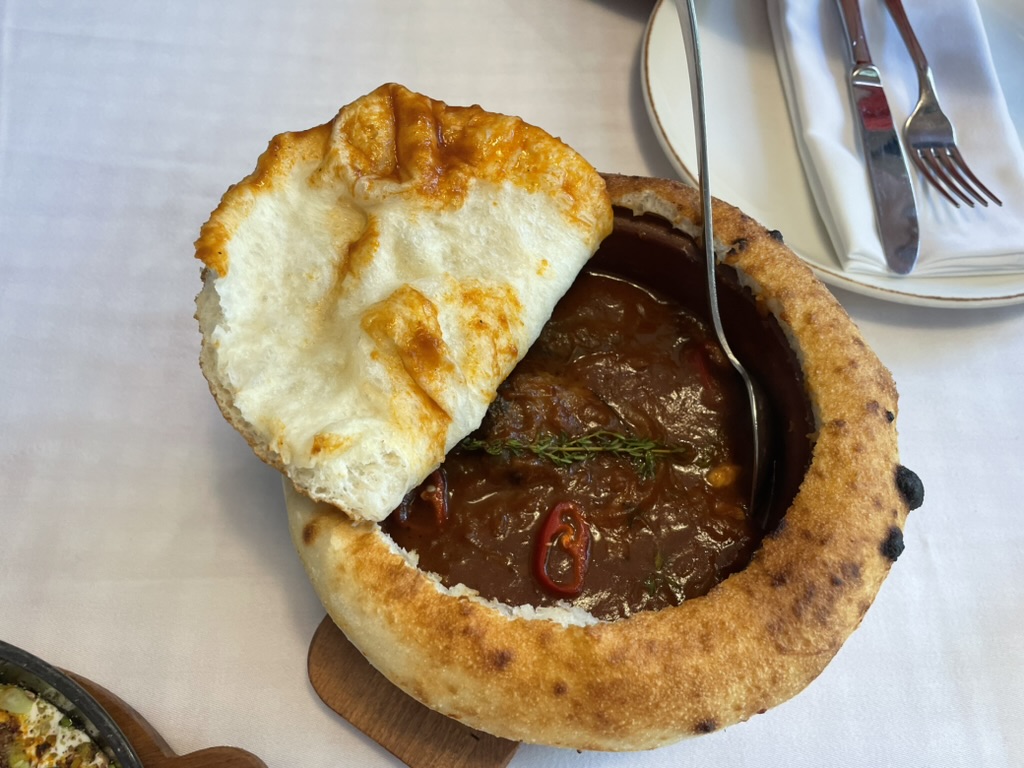 deep dish with a pastry top like a pie
