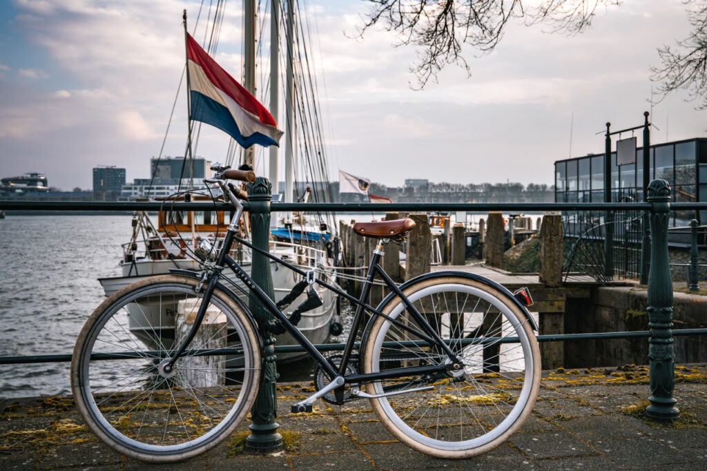 Netherlands with boats and the Dutch flag visible.