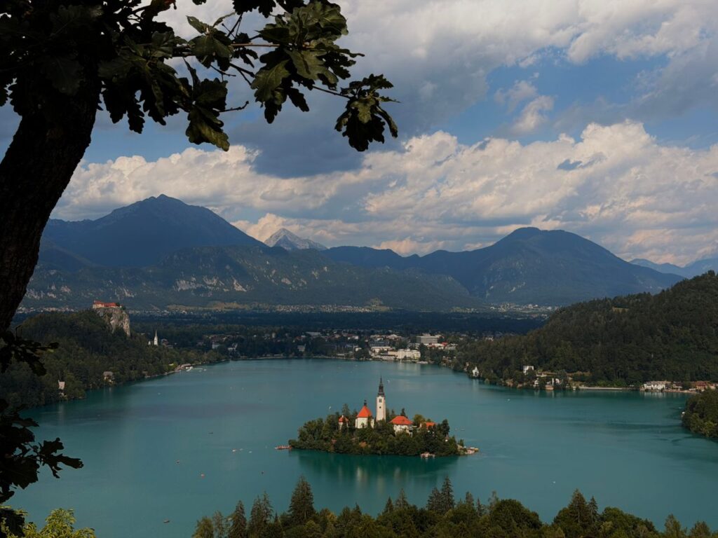 Picturesque Lake Bled with its iconic island church surrounded by mountains in Slovenia.